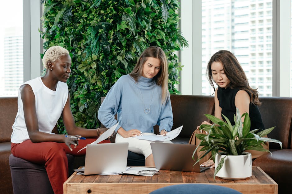 A group of diverse employees working together in an office setting